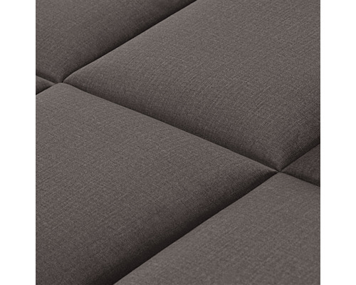 Detail čalouněného nábytku se čtvercovými přihrádkami