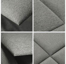 Detail šedého, prošívaného potahu nábytku.