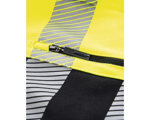 Detail žlutého pracovního oděvu se zipem