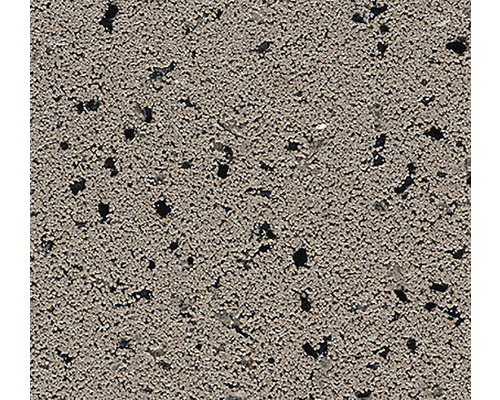 Detail strukturovaného povrchu s malými tmavými inkluzemi