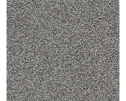 Detail šedého koberce.