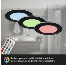 Tři kulatá stropní světla s různými barvami světla a dálkové ovládání v koupelně.