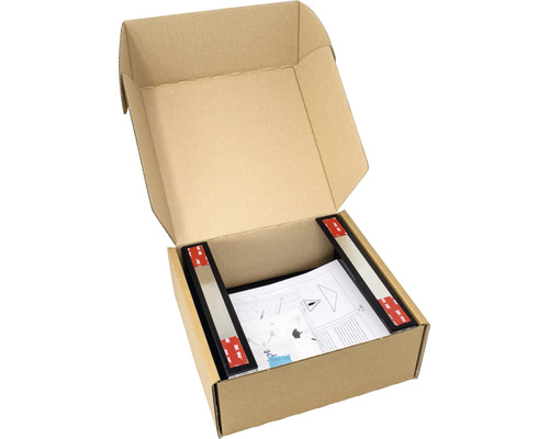 Otevřená kartonová krabice s černými profily a montážním návodem