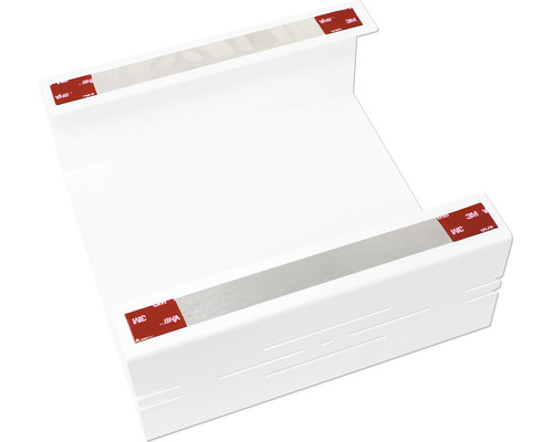 Bílý prvek kabelového žlabu s lepicími pásky pro upevnění