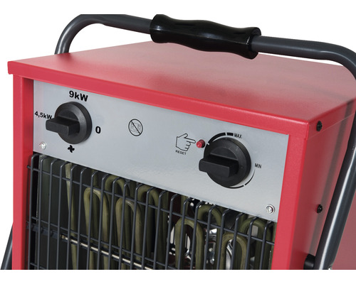 Detail elektrického topného ventilátoru s ovládacími prvky