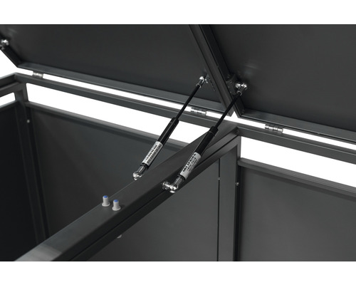 Detail otevřeného úložného boxu s plynovými vzpěrami