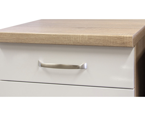 Detail skříně se zásuvkami a madlem