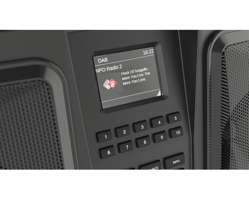 Detailní záběr digitálního rádia s displejem a klávesnicí