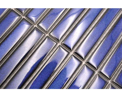 Detail mozaikových obkladaček ve tvaru tyče