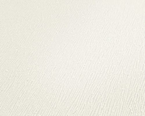 Detail světlé vliesové tapety s jemnou strukturou