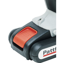 Detail akumulátorového přístroje s červeným knoflíkem