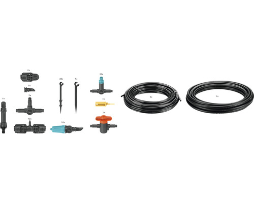 Zahradní zavlažovací systém s hadicemi, spojkami a zemními hroty pro zavlažování zahrady