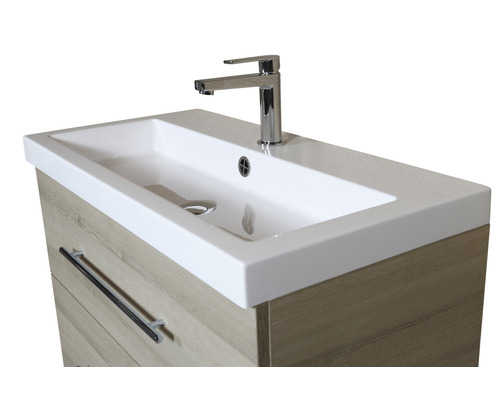 Umyvadlo se skříňkou a baterií