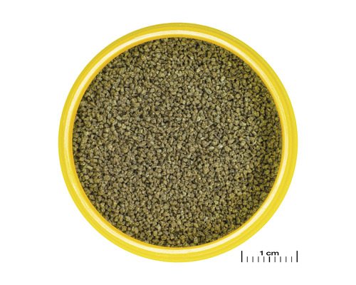 Granulované krmivo pro ryby v žluté nádobě