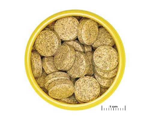 Krmivo ve formě tablet pro ryby v dóze