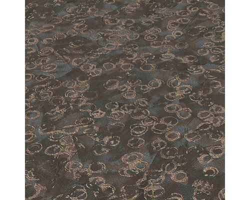 Detail strukturovaného povrchu podlahy se vzorem kruhů.