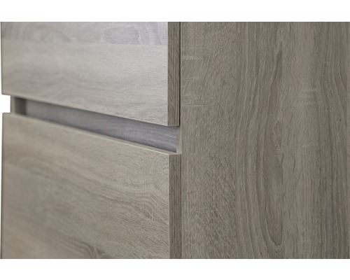 Detailní pohled na nábytek s dřevěnou strukturou a zásuvkami