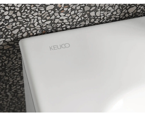Logo Keuco na bílém povrchu