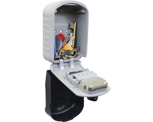 Otevřený trezor na klíče s několika klíči