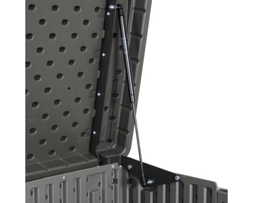 Detail otevřeného úložného boxu s plynovou pružinou