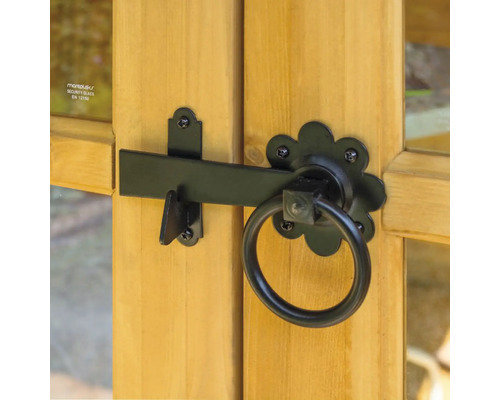 Zámek s kruhovou rukojetí na dřevěných dveřích