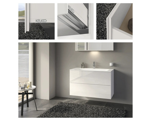 Moderní koupelna s bílou skříňkou pod umyvadlo a logem Keuco