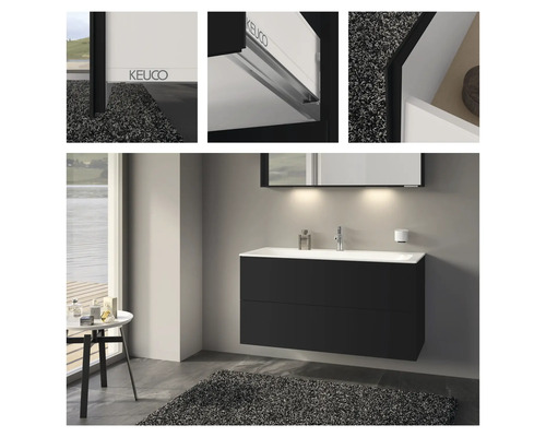 Moderní koupelna s černou skříňkou pod umyvadlo, bílým umyvadlem na desku a zrcadlem