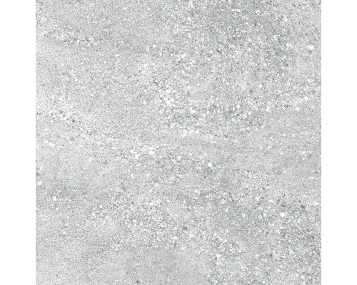 Šedá keramická dlaždice se skvrnitým povrchem.