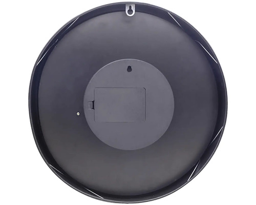 Zadní strana kulatých nástěnných hodin s prostorem pro baterie a závěsným zařízením