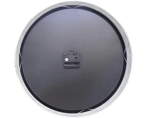 Zadní strana nástěnných hodin se strojkem