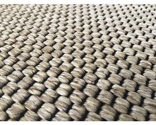 Detailní záběr tkaného koberce