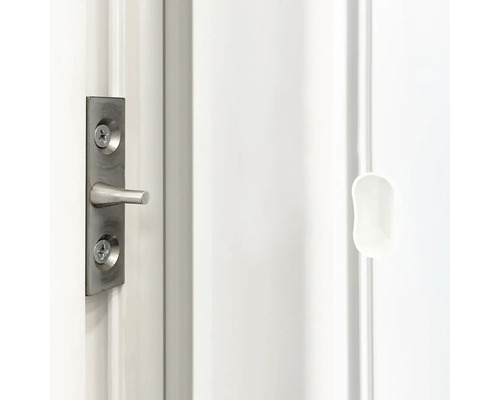 Detailní pohled na zámek dveří s otočným knoflíkem na dveřích