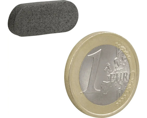 Brusný kámen vedle euro mince