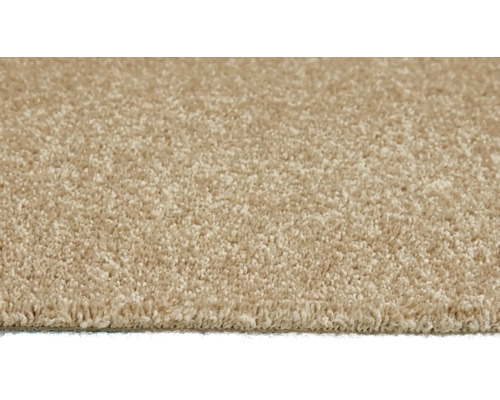 Detail béžového koberce