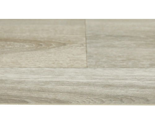 Detail světlé laminátové podlahy s dřevěným vzhledem