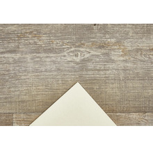 Dřevěná podlaha se vzorem a list papíru