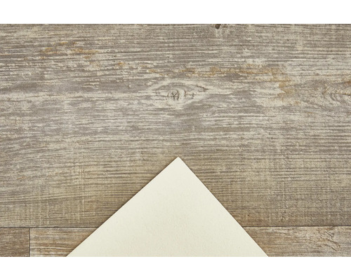 Dřevěná podlaha se vzorem a list papíru