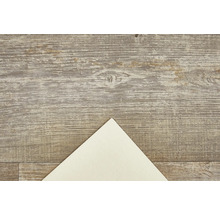 Dřevěná podlaha se vzorem a papírem