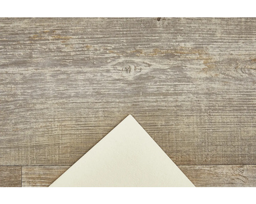 Dřevěná podlaha se vzorem a papírem