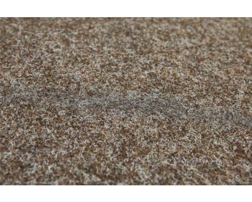 Detail hnědého koberce