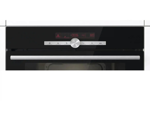 Detailní záběr černé vestavné trouby s displejem a otočným knoflíkem