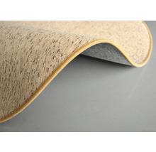 Detailní záběr korkové podložky s textilním lemem.