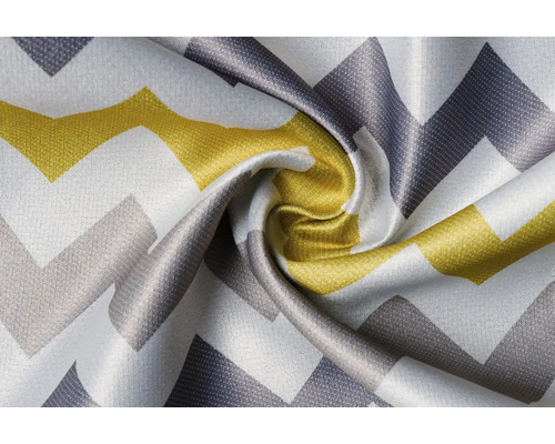 Detail dekorační látky s cikcakovým vzorem