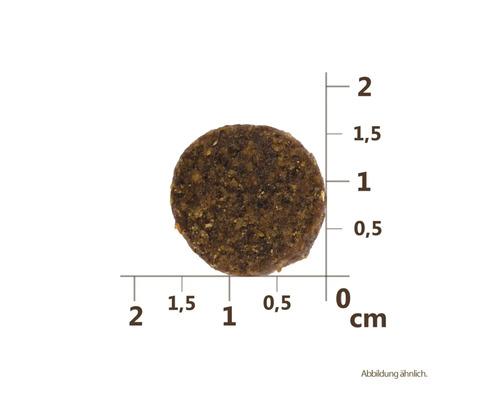 Hnědé kulaté suché krmivo s uvedením centimetrů