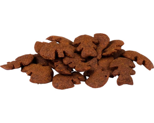 Hromada krmiva pro zvířata ve tvaru vánočních stromků a jelenů