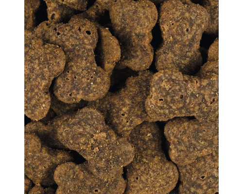 Krmivo pro psy ve tvaru kostí, detailní záběr