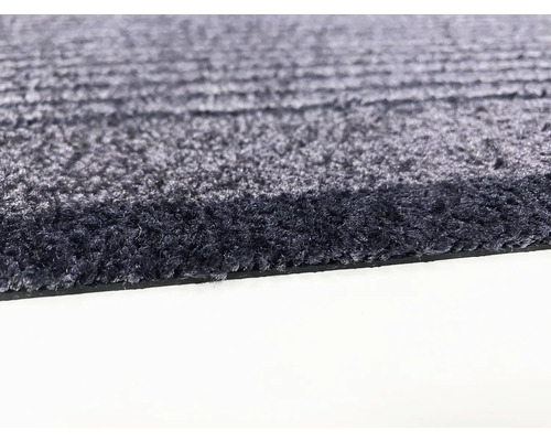 Detailní pohled na koberec s textilní strukturou