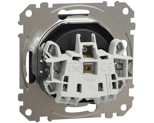 Detail elektrického spínače s montážní deskou a připojovacími svorkami.