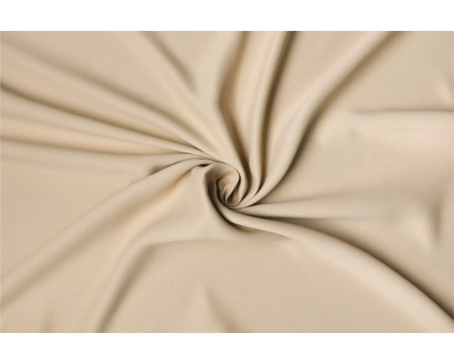 Béžová látka ve stočeném tvaru