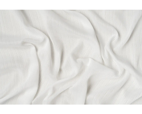 Detail bílé látky se záhyby